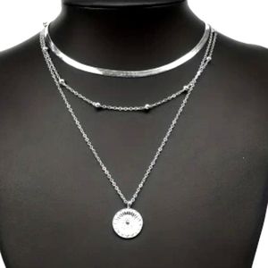 New silver-plated three layer necklace with silver medallion pendant